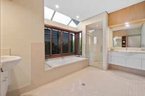Shower, towels, soap, toilet paper