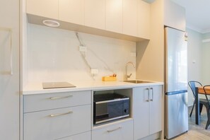 Superior Suite | Private kitchen | Microwave, toaster