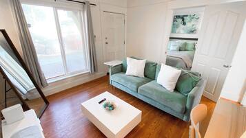 1 bedroom, desk, iron/ironing board, travel crib