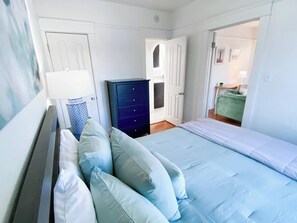 1 bedroom, desk, iron/ironing board, travel cot