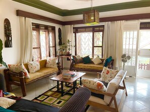 Room, 1 Bedroom, Smoking, Balcony | Living room | Books - Room-guest Room 2 - A Home Away From hom (Kampala)