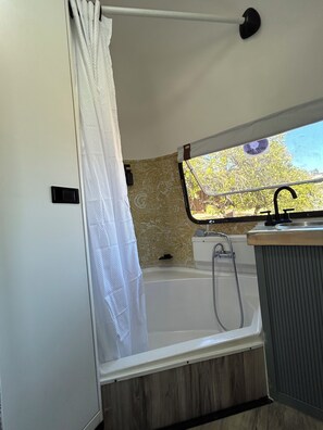 Shower, towels, soap, shampoo - Charming Glamping - Stay in Style: Airstream + Views in Spring Valley (Spring Valley)