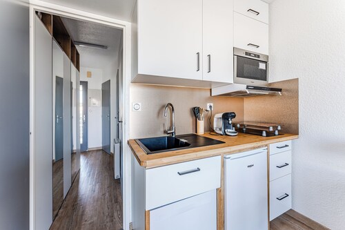 Appartement moderne avec terrasse et accès direct à la plage