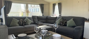 Cosy Caravan in a quiet corner of the site - with a beautiful sea view!