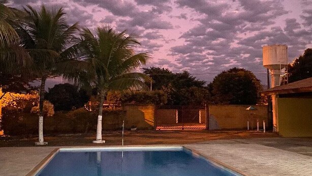 A rectangular swimming pool with a clear blue water surface, surrounded by a brick patio. - Santa Maria da Serra Farm, sleeps up to 2 people (Maria vitoria 1 Dois Córregos)