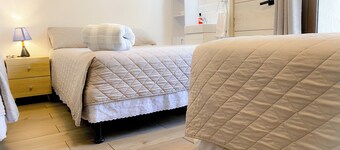 Cozy 1-bedroom for families at Inn. WiFi and AC. In Guatemala. Close airport.
