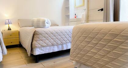 Cozy 1-bedroom for families at Inn. WiFi and AC. In Guatemala. Close airport.