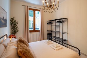 1 غرفة نوم ومكواة/لوح كي وواي فاي وملاءات أسرّة