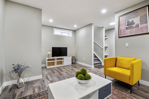 A newly renovated modern 2-bedroom suite, with laundry and full kitchen
