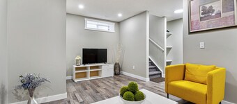 A newly renovated modern 2-bedroom suite, with laundry and full kitchen