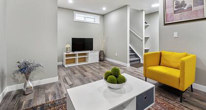 A newly renovated modern 2-bedroom suite, with laundry and full kitchen