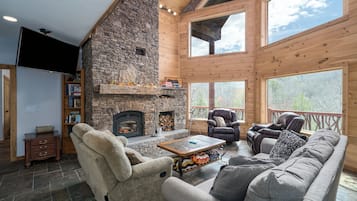 Smart TV, fireplace, foosball, books
