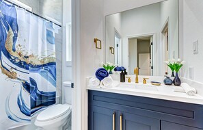 Jetted tub, hair dryer, towels, soap