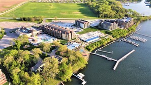 Stunning waterfront complex with a marina, offering scenic views and access to the water.