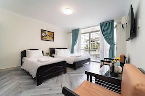 Deluxe Room, Balcony, City View | Premium bedding, minibar, free WiFi, bed sheets