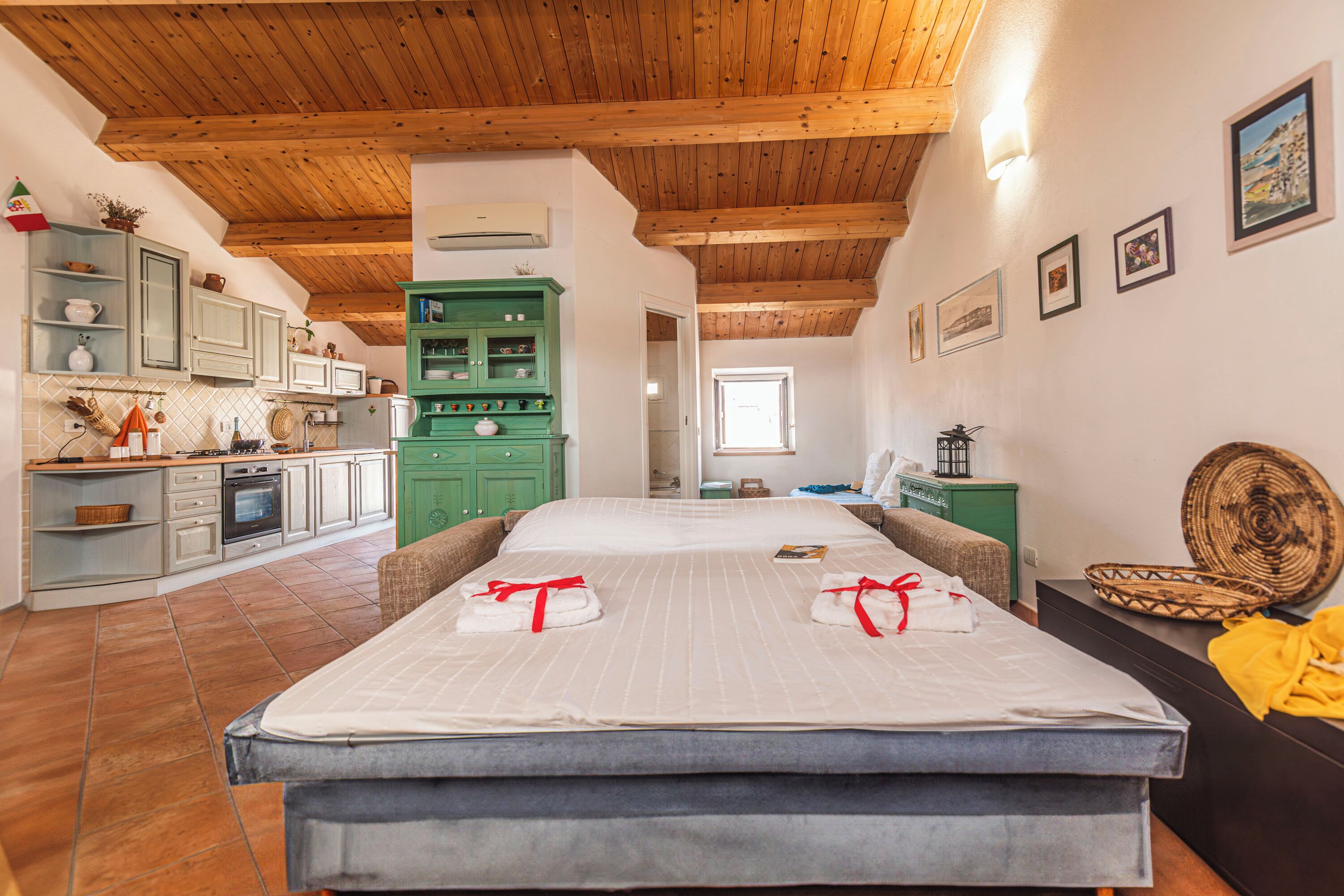 Estúdio família (Una Mansarda Nell'isola) | Roupa de cama