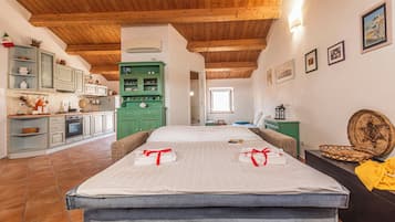 Monolocale familiare (Una Mansarda Nell'isola) | Lenzuola