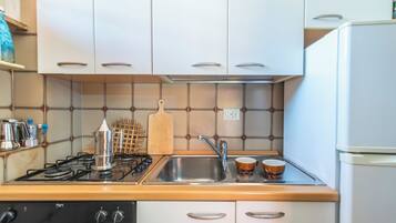 Standard Penthouse, 2 Bedrooms, Sea Facing (Coral House 2) | Private kitchen | Fridge, microwave, oven, stovetop