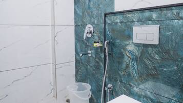 Shower, free toiletries, towels, soap