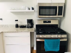 Fridge, coffee/tea maker, cookware/dishes/utensils, paper towels - Charming 2-bedroom apartment near BC, BU, Harvard, T and more (Boston)