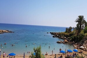 Na praia, areia branca 