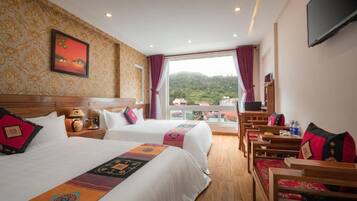 Hypo-allergenic bedding, down comforters, minibar, in-room safe