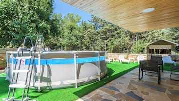 Seasonal outdoor pool, pool loungers