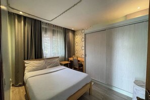 1 chambre, fer et planche à repasser, Wi-Fi, draps fournis