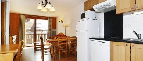 Fridge, microwave, cookware/dishes/utensils