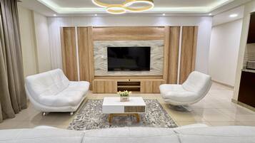 Basic Apartment | Living area | TV