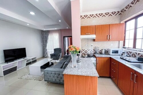 Sherehe Apartments, Unit 1