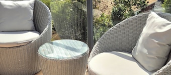 Panoramic vista from city to the sea. Enjoy the opulence of gardens and space