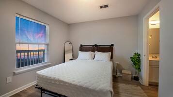 1 bedroom, desk, iron/ironing board, travel cot