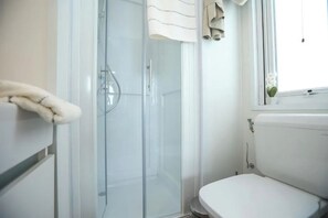 Shower, free toiletries, hair dryer, towels