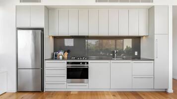 Apartemen, 2 kamar tidur | Dapur pribadi | Lemari es besar, microwave, oven, dan kompor