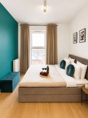 2 slaapkamers, een strijkplank/strijkijzer, internet, beddengoed