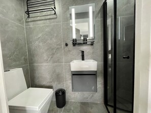 Hair dryer, towels, soap, shampoo