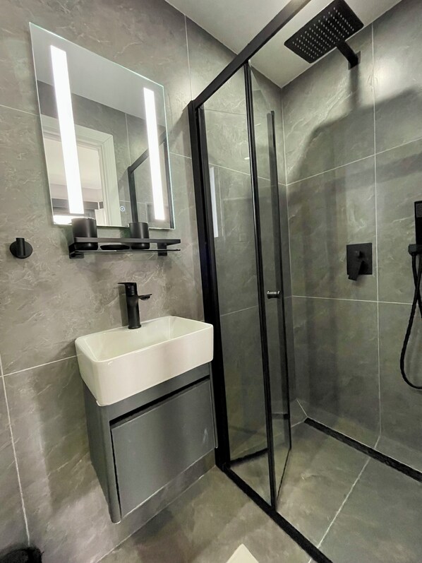 Hair dryer, towels, soap, shampoo