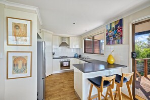 Fridge, oven, coffee/tea maker, cookware/dishes/utensils