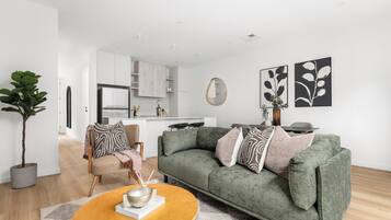 Apartment, 2 Bedrooms, Balcony | Living area | Flat-screen TV