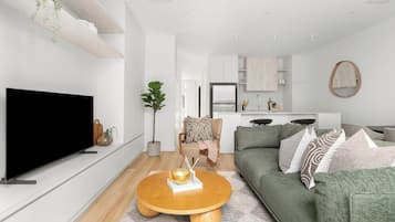 Apartment, 2 Bedrooms, Balcony | Living area | Flat-screen TV