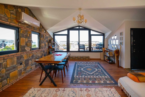 Loft Deluxe, vista al mar | Área de sala de estar | Impresora