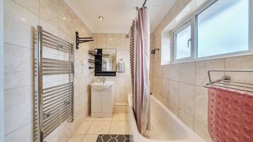 Separate bathtub and shower, deep-soaking bathtub, free toiletries