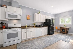 Fridge, microwave, oven, stovetop - Spacious retro-inspired home in near downtown (Louisville)