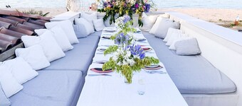 Elegant beachfront villa with jacuzzi, garden, and panoramic terrace.