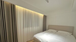 Apartemen Keluarga, pemandangan kota | 3 kamar tidur, tempat tidur bayi gratis, Wi-Fi gratis, dan seprai linen