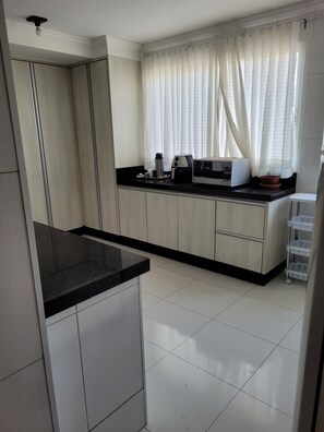 Apartment | Private kitchen - Hotel Globo de Cianorte (Cianorte)