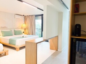 A modern hotel room with a bed, bedside table, and a view of the outdoors. - Siar Rooms (Durres)