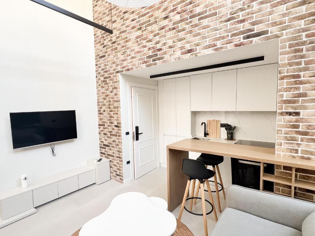 Family Suite | Living area | TV