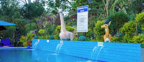 Outdoor pool, pool umbrellas, sun loungers